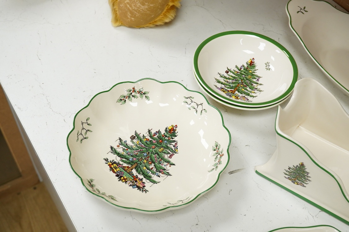 A Spode table service, Christmas Tree pattern. S 3324 to include a set of four bowls, platter and dishes, with some boxes, largest 36cm wide